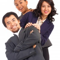optimistic young businesspeople on a white background